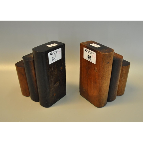 46 - Pair of novelty bookends, both marked with plaque 'Made from teak wood from the RMS Mauretania.
(B.P... 