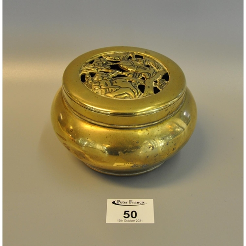 50 - Oriental brass hand warmer or censer with open work lid. Character marks to the base. 
(B.P. 21% + V... 