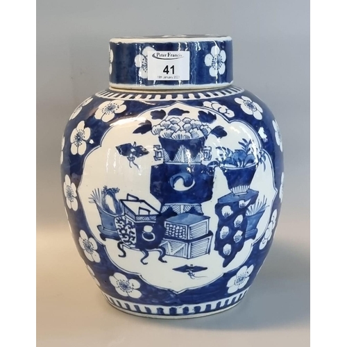 41 - Chinese porcelain baluster shaped ginger jar and cover. Overall decorated with prunus blossom on a c... 