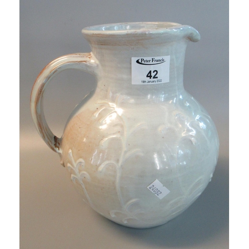 42 - Early 20th Century glazed terracotta pottery baluster shaped loop handled jug with slip ware foliate... 