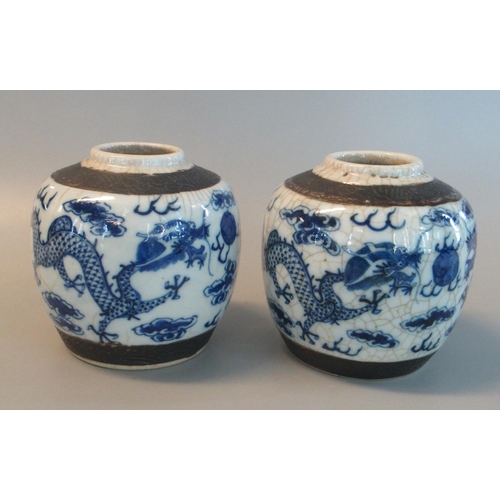 49 - Pair of Chinese Stoneware Crackle glaze  Blue and white Ginger Jars, decorated with dragons amongst ... 