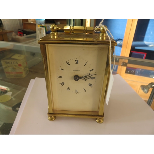 47 - Dominion Brass and Glazed Carriage Clock