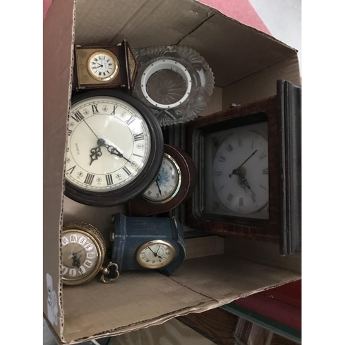 Box containing miniature clocks