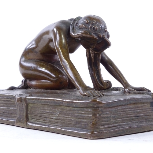 46 - FRANZ BERGMAN - Austrian patinated bronze sculpture, nude figure kneeling on a book, unsigned, lengt... 