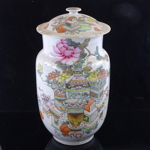 59 - A Chinese Qianjiang cai enamelled Antiquity jar and cover, decorated with various antiques to one si... 