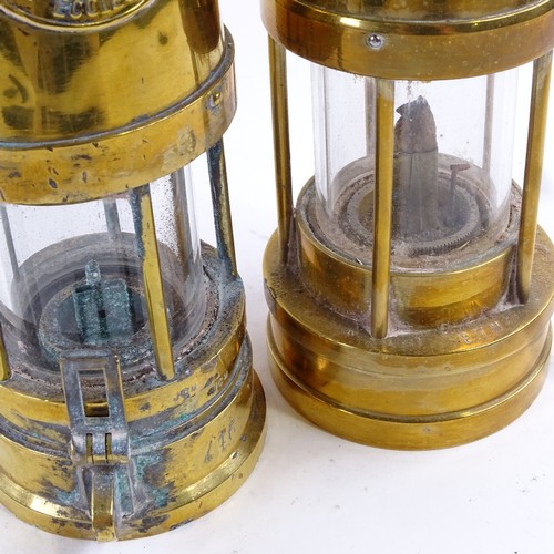 60 - Two brass miners lamps, made by E Thomas & Williams, Aberdare, Wales and The Protector Lamp & Lighti... 