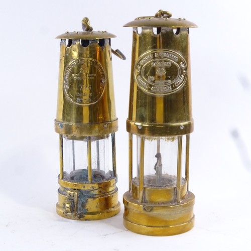 60 - Two brass miners lamps, made by E Thomas & Williams, Aberdare, Wales and The Protector Lamp & Lighti... 
