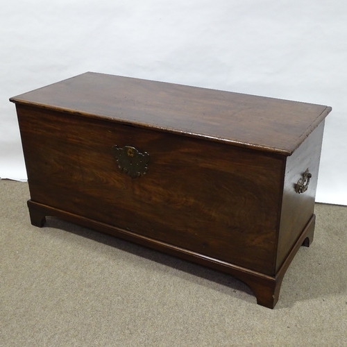 154 - A solid mahogany coffer, probably 18th century, with brass carrying handles and bracket feet, length... 