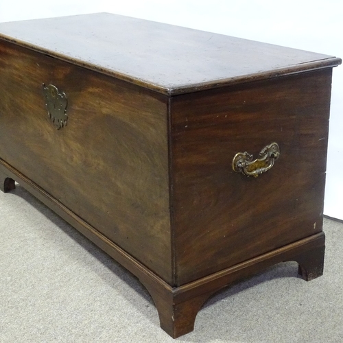 154 - A solid mahogany coffer, probably 18th century, with brass carrying handles and bracket feet, length... 