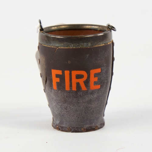 10 - A Victorian Doulton Lambeth Silicon ware silver mounted miniature fire bucket, imitation leather bod... 