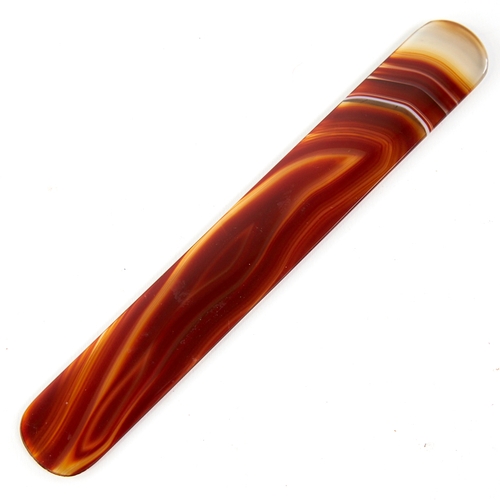 11 - A polished red banded agate page turner, length 21cm