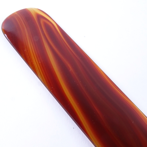 11 - A polished red banded agate page turner, length 21cm
