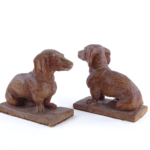20 - A pair of early 20th century carved oak Dachshunds, length 11cm