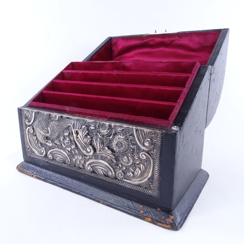 7 - An Edwardian silver mounted stationery box, curved lid with relief embossed bird and foliate decorat... 