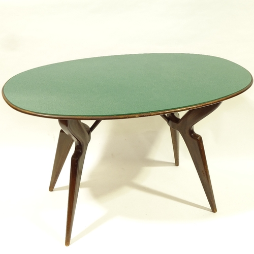 2176 - A 1950s' Italian oval dining table, in the manner of Ico Parisi, with stylised wood frame and revers... 