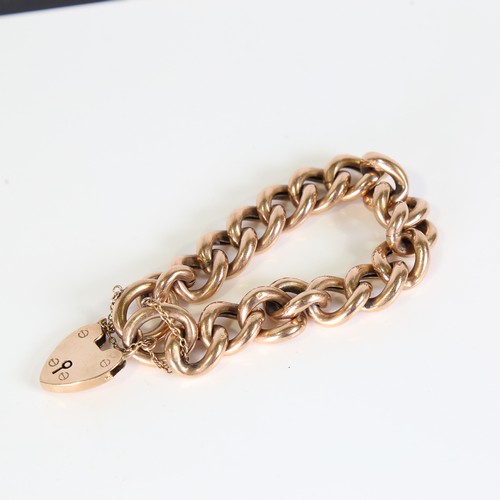 66 - A mid-20th century 9ct rose gold hollow curb link bracelet, maker's mark LW&G, bracelet length 17cm,... 