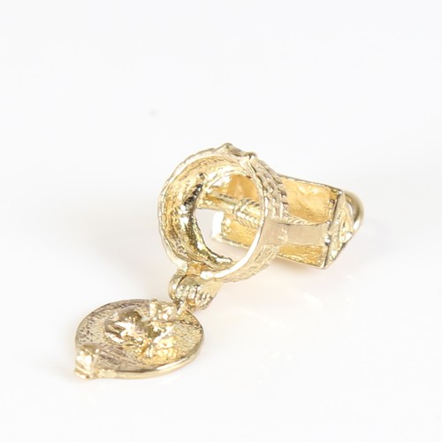 69 - A late 20th century 9ct gold Wishing Well charm, the base opening to reveal a cat, maker's marks G&T... 