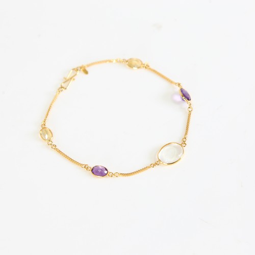 77 - A modern handmade 14ct gold gem-set bracelet, gemstones include cabochon moonstone, citrine and amet... 