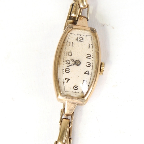 12 - A lady's Vintage 9ct gold mechanical wristwatch, silvered dial with Arabic numerals and 9ct expandin... 