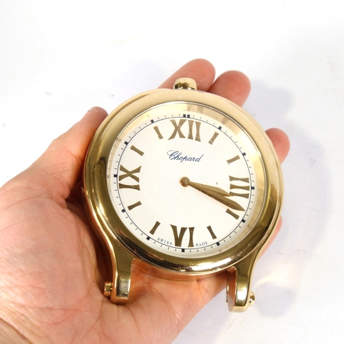 13 - CHOPARD - a large gold plated Happy Sport quartz table clock, silvered dial with gilt quarterly Roma... 