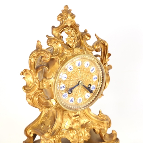 19 - A 19th century French gilt-bronze ormolu 8-day mantel clock under glass dome, by Grohe of Paris, gil... 