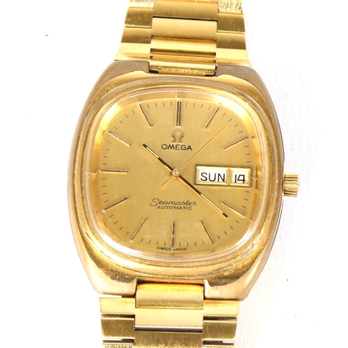 9 - OMEGA - a Vintage gold plated stainless steel Seamaster automatic wristwatch, ref. 166.0213, champag... 