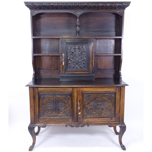2022 - An Antique oak 2-section dresser, with 3 carved panelled drawers, on cabriole legs, (with keys) W138... 