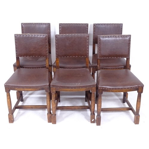 2042 - A set of 6 oak and leather seated dining chairs