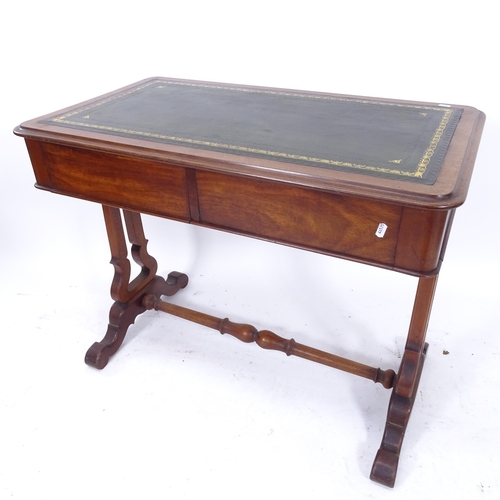 2054 - A 19th century mahogany writing desk, with a tooled green leather skiver and 2 frieze drawers on lyr... 