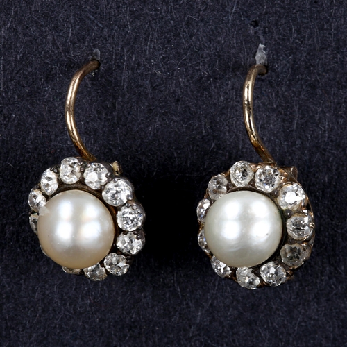 464 - A pair of Antique whole pearl and diamond cluster earrings, set with old-cut diamonds, total diamond... 