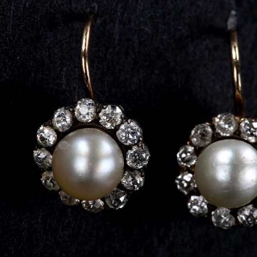 464 - A pair of Antique whole pearl and diamond cluster earrings, set with old-cut diamonds, total diamond... 