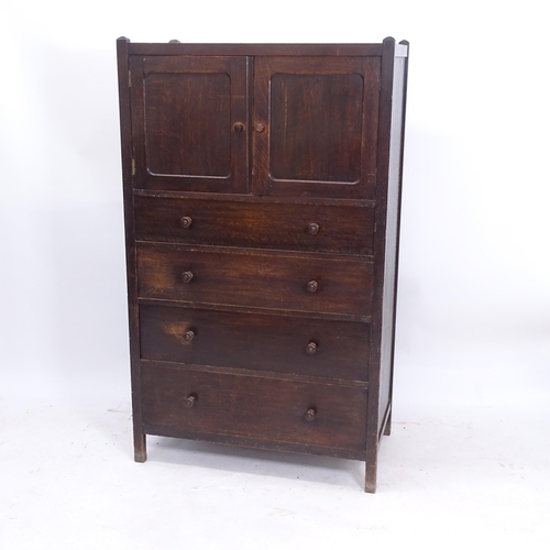 2087 - An oak Arts and Crafts Heals Letchworth tallboy cabinet, with fitted cupboards and drawers (1 of onl... 