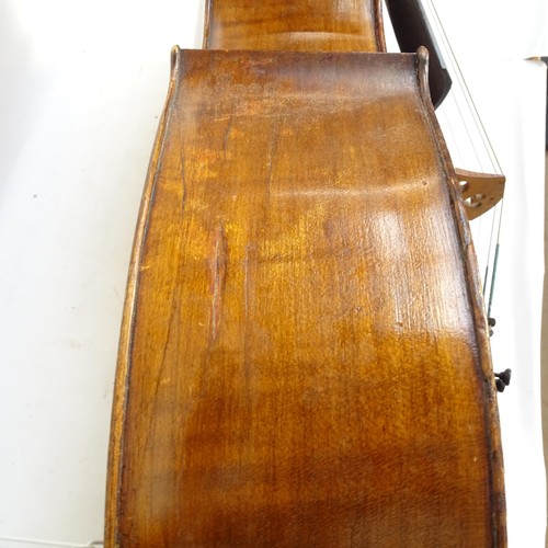923 - A Vintage cello, back length 75cm, with carrying case, bows and music stand