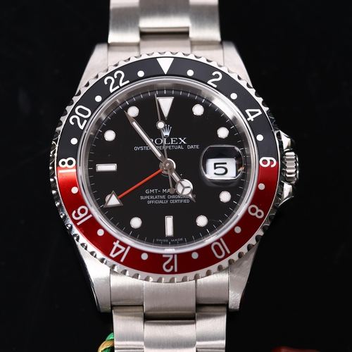 2 - ROLEX - a stainless steel 'Coke' GMT Master II Oyster Perpetual Date automatic bracelet watch, ref. ... 
