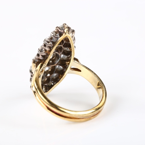 105 - A large Antique diamond marquise panel ring, set with Dutch rose-cut diamonds, in unmarked gold sett... 
