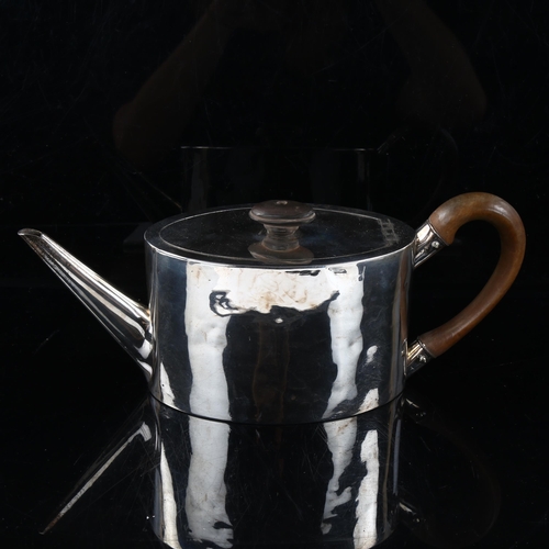 402 - A George III silver oval teapot, by Andrew Fogelberg and Stephen Gilbert, hallmarks London 1786, hei... 