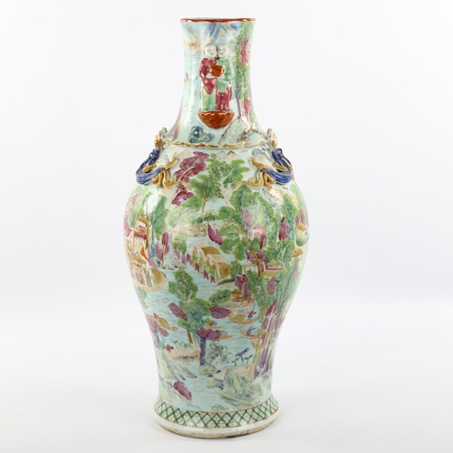 1026 - A large Chinese famille rose porcelain vase, with double-figure handles, dragon mounted neck and han... 