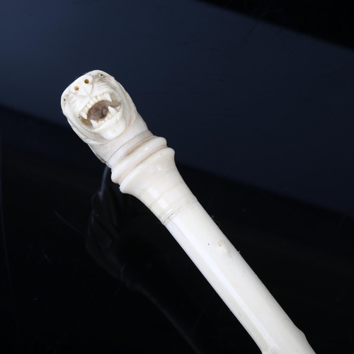 1029 - A 19th century Indian sectional ivory walking stick, with double elephant/lion headed handle, length... 