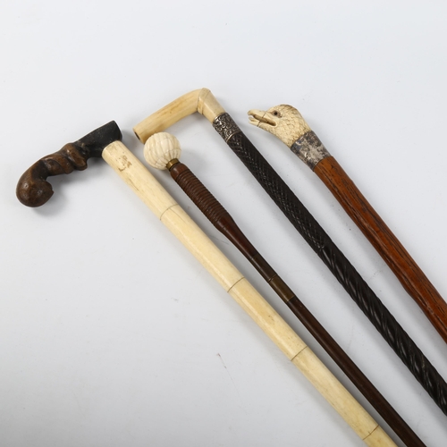 1031 - A group of 4 various walking sticks, including carved ivory eagle's head handle with silver mount (4... 