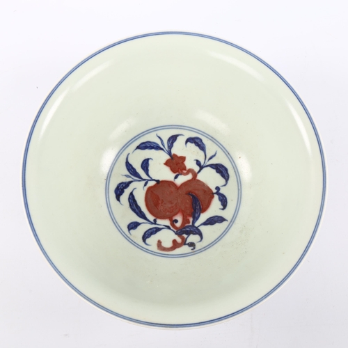 1037 - A Chinese Doucai porcelain bowl, the interior painted with fruit, the exterior painted with fish, 6 ... 