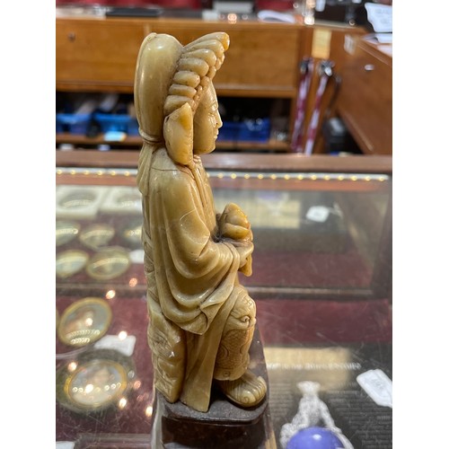 1035A - A Chinese carved soapstone seated figure, on soapstone base, height 20cm - BBC Antiques Road Trip