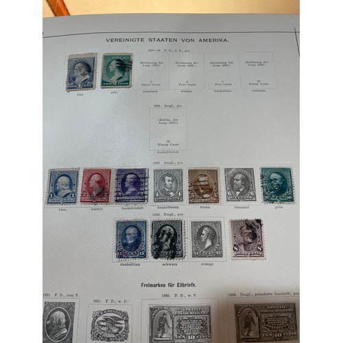 1034 - Schaubeks Briefmarken stamp album, half leather-bound, containing world postage stamps