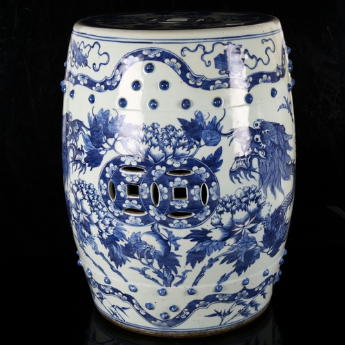 1015 - A Chinese blue and white 'Dragon' garden barrel seat, 19th century, underglaze blue decorated with t... 