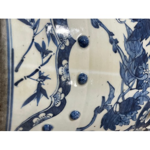 1015 - A Chinese blue and white 'Dragon' garden barrel seat, 19th century, underglaze blue decorated with t... 