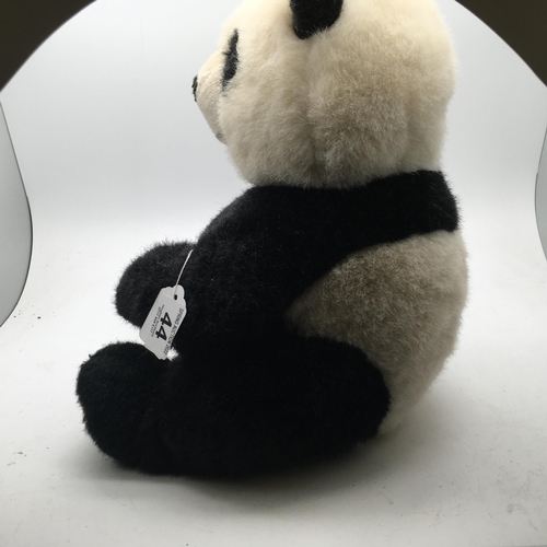 44 - Steiff Animal with original label and ear pin, Large seated Panda, 12