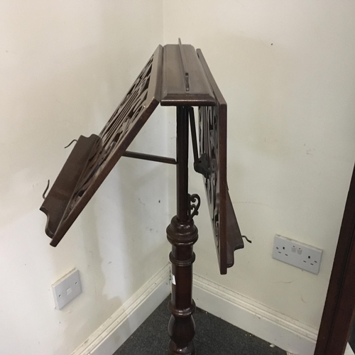 19 - Classical Victorian period double music stand telescopic action to the centre on tripod supports