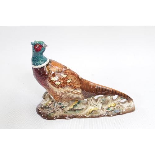 25 - Beswick Model of a Cock Pheasant on naturalistic setting