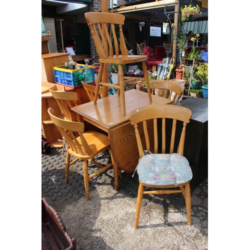 23 - Pine gateleg table and a set of 6 Dining chairs