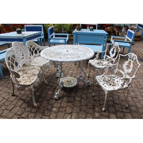 39a - White Painted Pierced Garden table with 2 matching chairs and Bench of Foliate Form