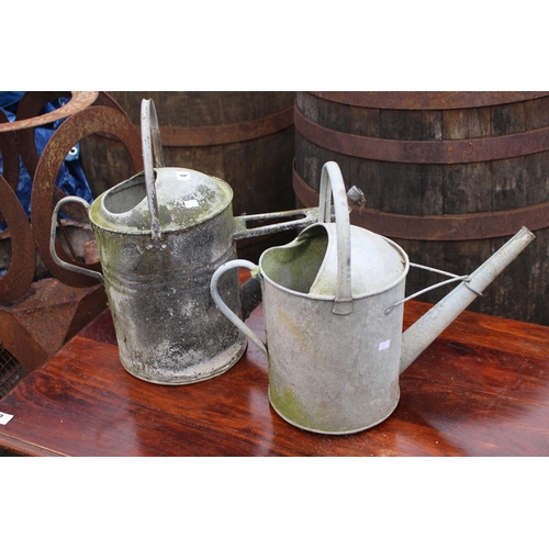 4 - 2 Galvanised Watering Cans